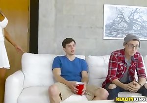 Tanned blonde fucked on all fours on a bed